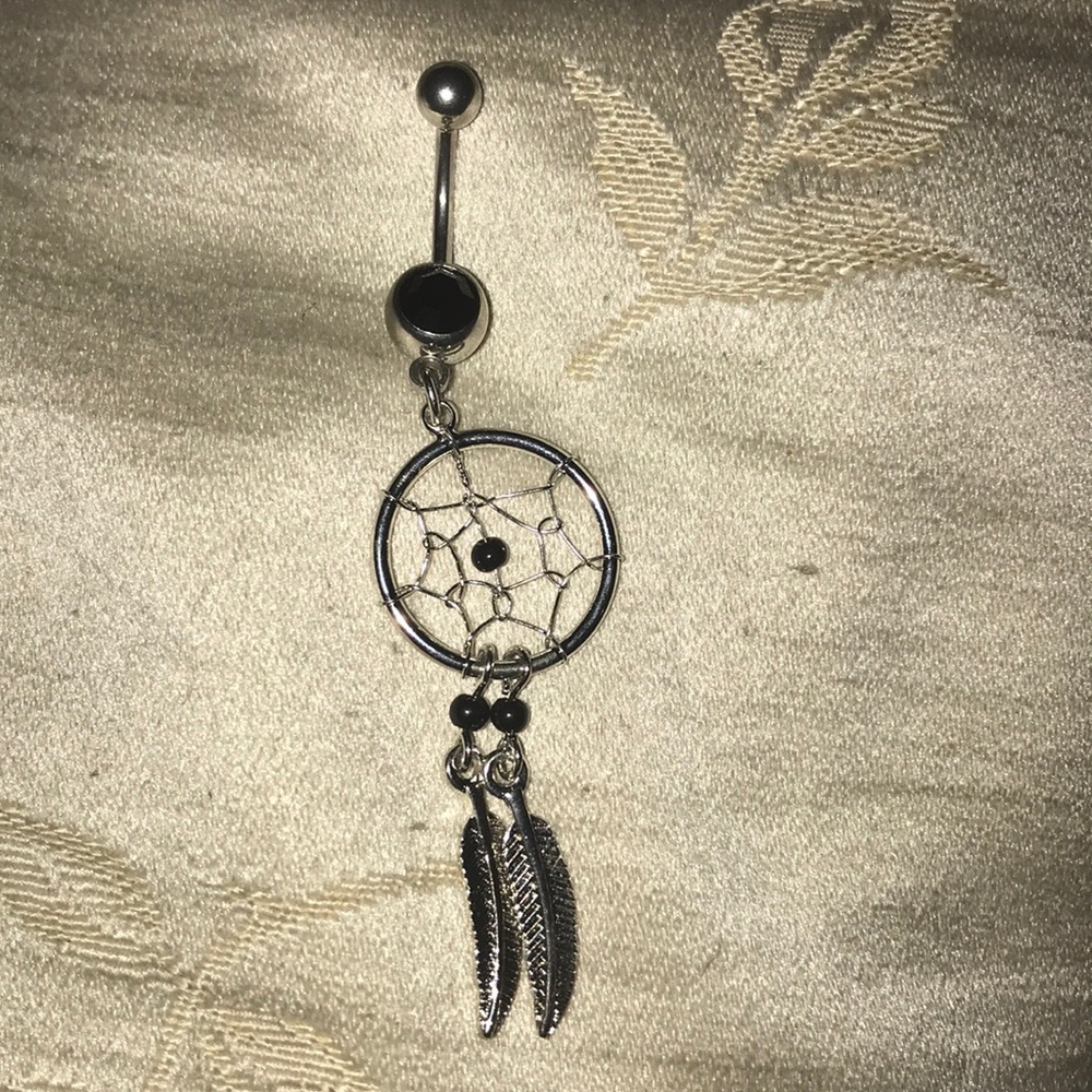 Dream catcher belly button piercing